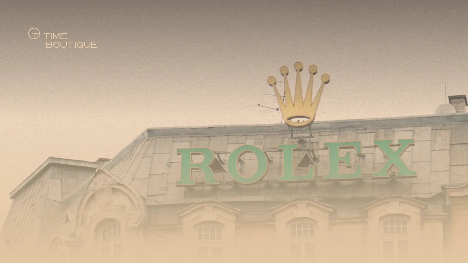 Rolex crown and lettering on a historic building