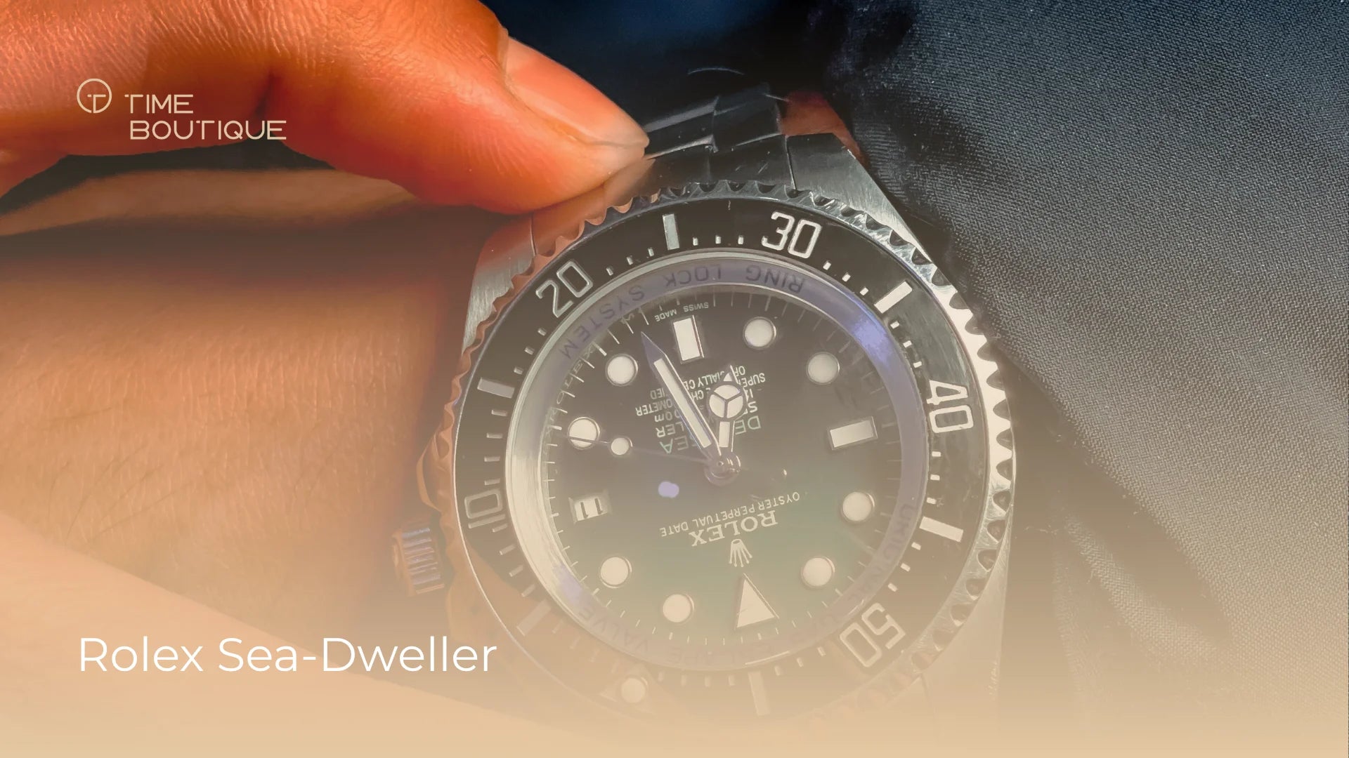 Rolex Sea-Dweller auf nassem dunklem Stein